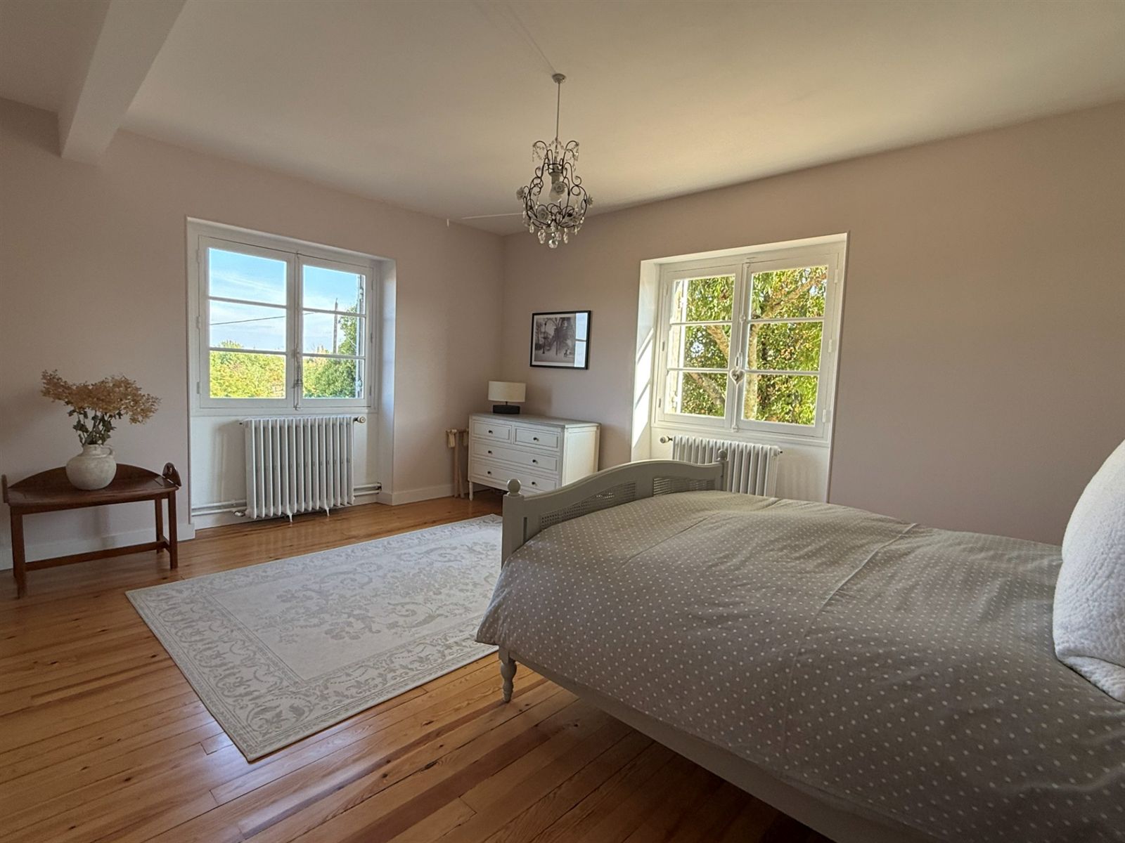 Bedroom corner with armchair and window